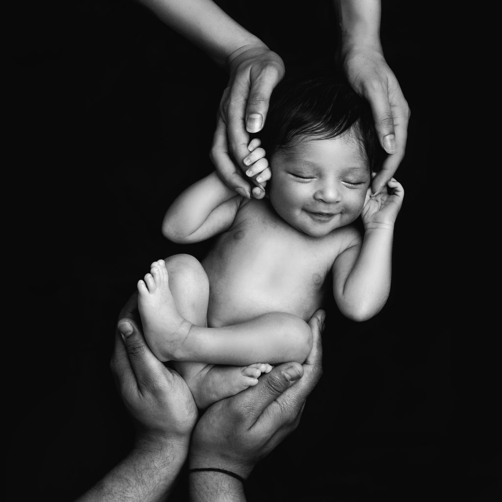 black-and-white-cute-baby-smiling-asleep-surrey-baby-photographer