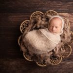 newborn-sleeping-in-rustic-basket-surrey-newborn-photographer-near-me