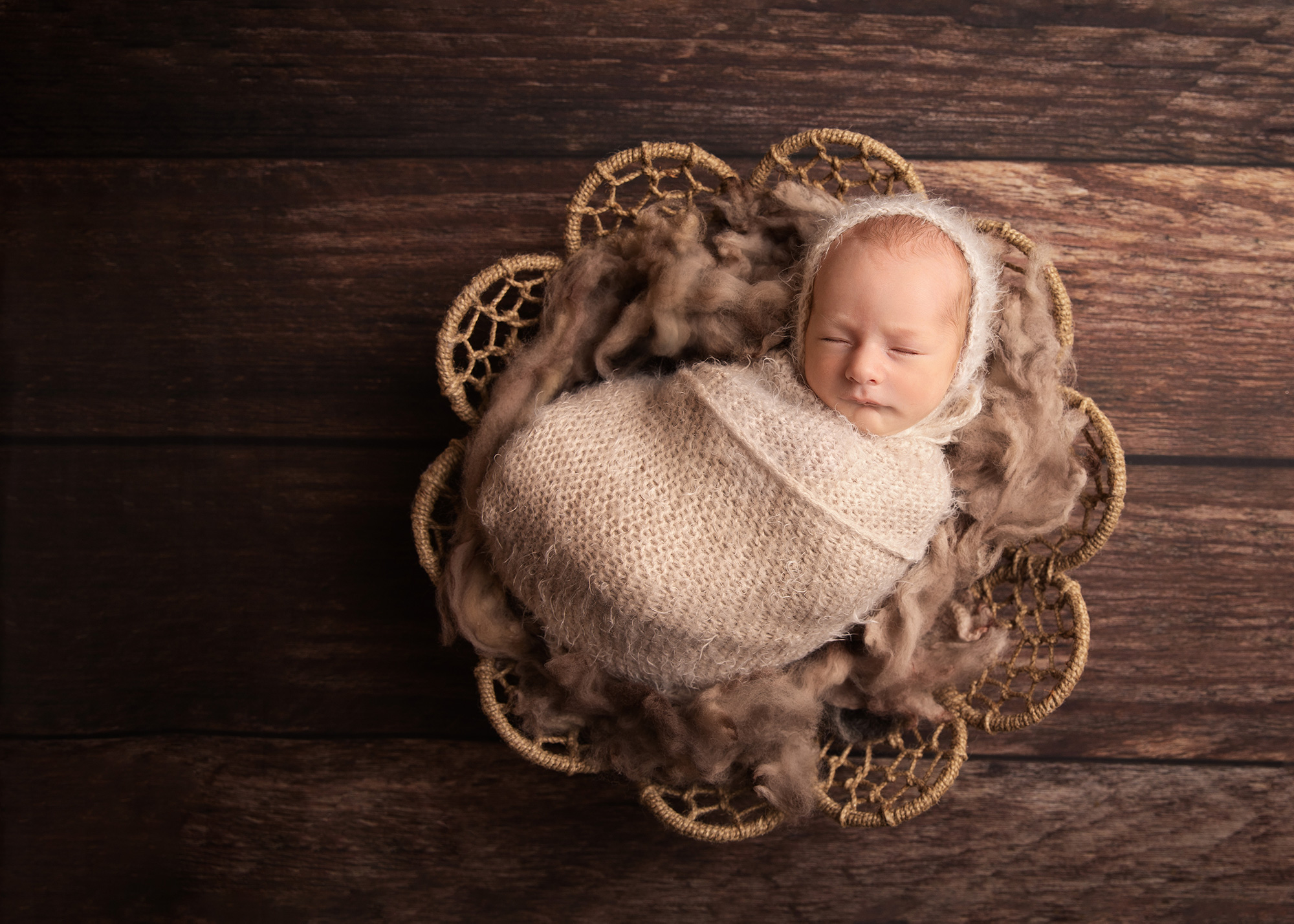 newborn-sleeping-in-rustic-basket-surrey-newborn-photographer-near-me